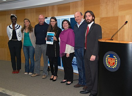 Bhem Solutions, from Universidade Federal de Minas Gerais, with judges Luiz Langbeck (L), Marcelo Tambascia and competition director Rene Jose Rodrigues Fernandes (R).