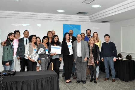 I2P Latin America 2014 winner, judges and competition directors Nadia Raposo and Rene Fernandes.